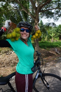 Kiri with our free rambutans that we had been gifted from a Malaysian guy on a motorbike. 