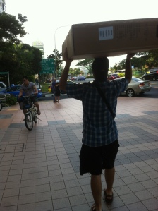 Carrying the bike boxes we got back to our hostel. 