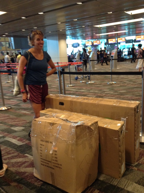 Waiting at the Singapore airport with all our boxes!